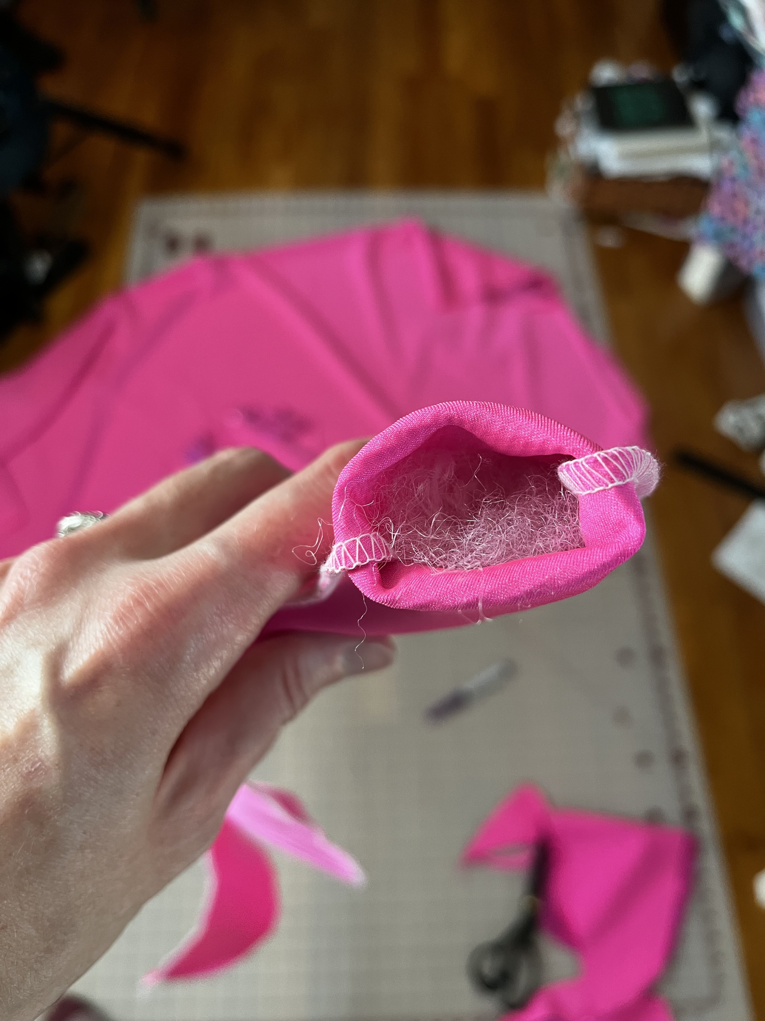 A photograph of the tentacle inside, showing a bit of fluff peeking out where the tip was inverted.